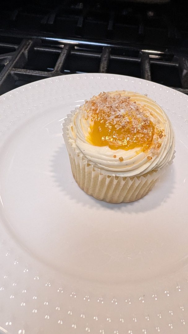 Tropical dream vanilla cake with mango filling and coconut Swiss meringue buttercream