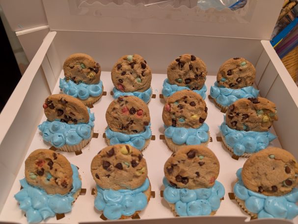 Chocolate vanilla cupcakes with vanilla buttercream and mini cookies